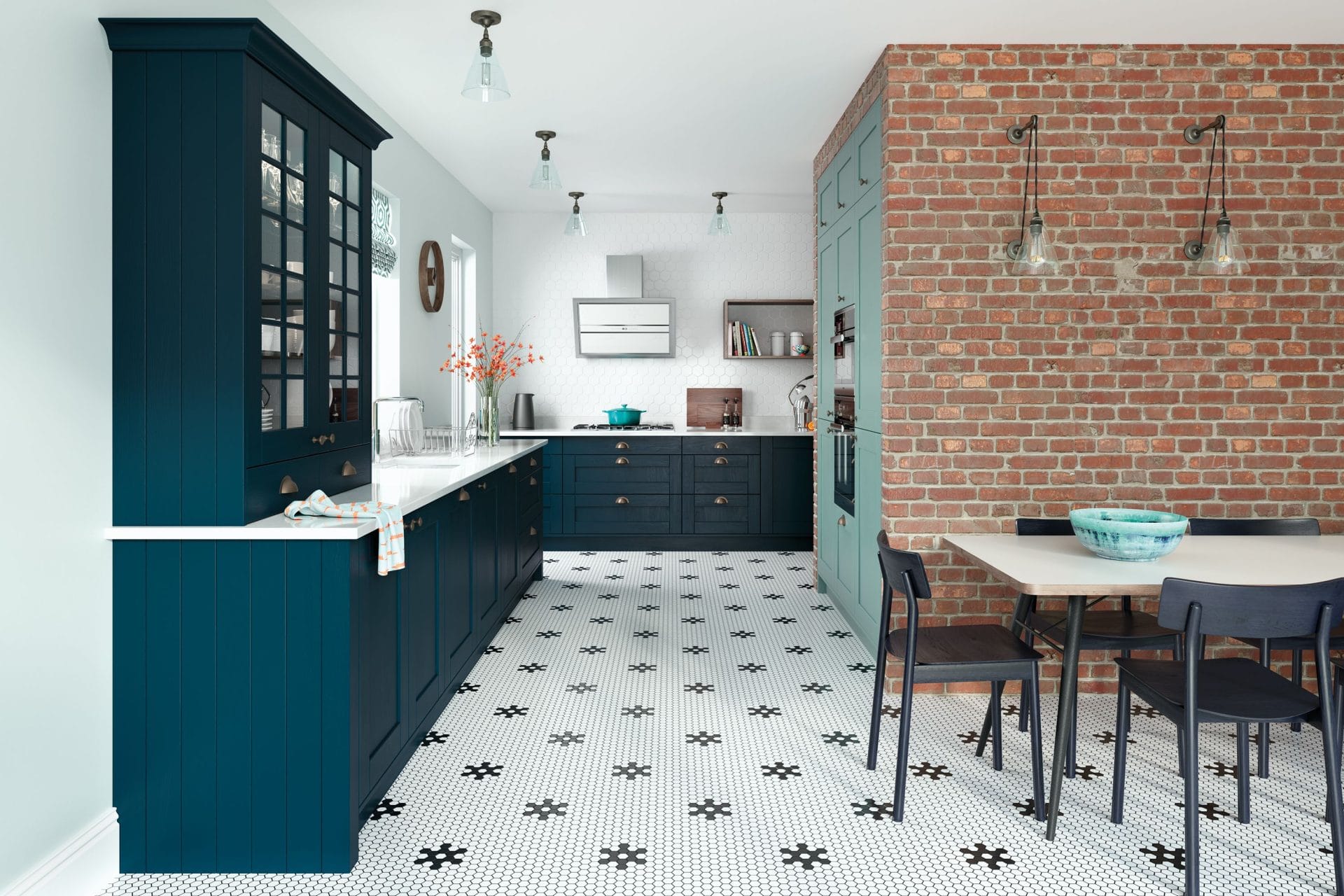 Navy shaker kitchen with exposed brick wall and mosaic floor tiles